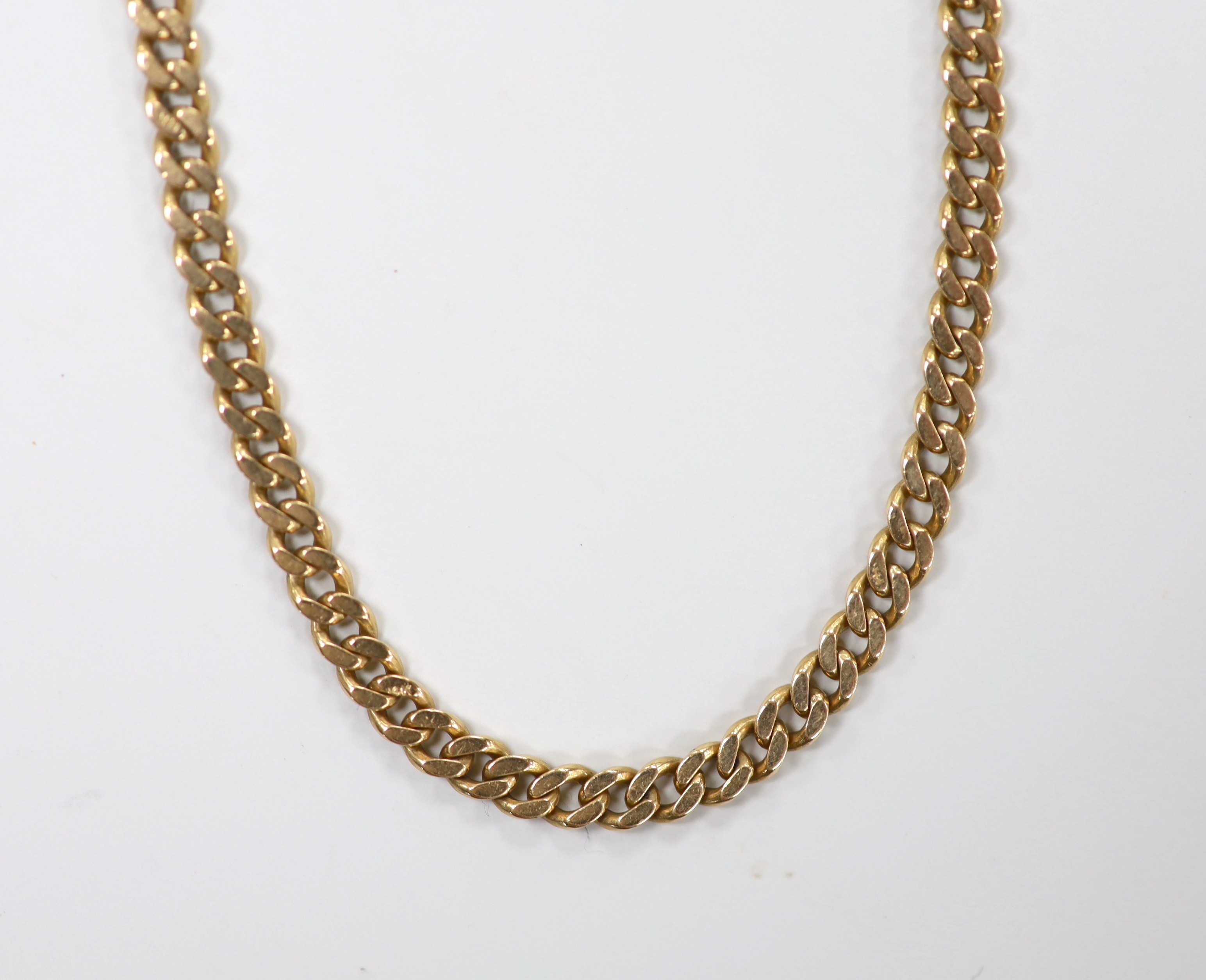 A modern yellow metal (stamped 18) curb link chain, 38cm, 18 grams.